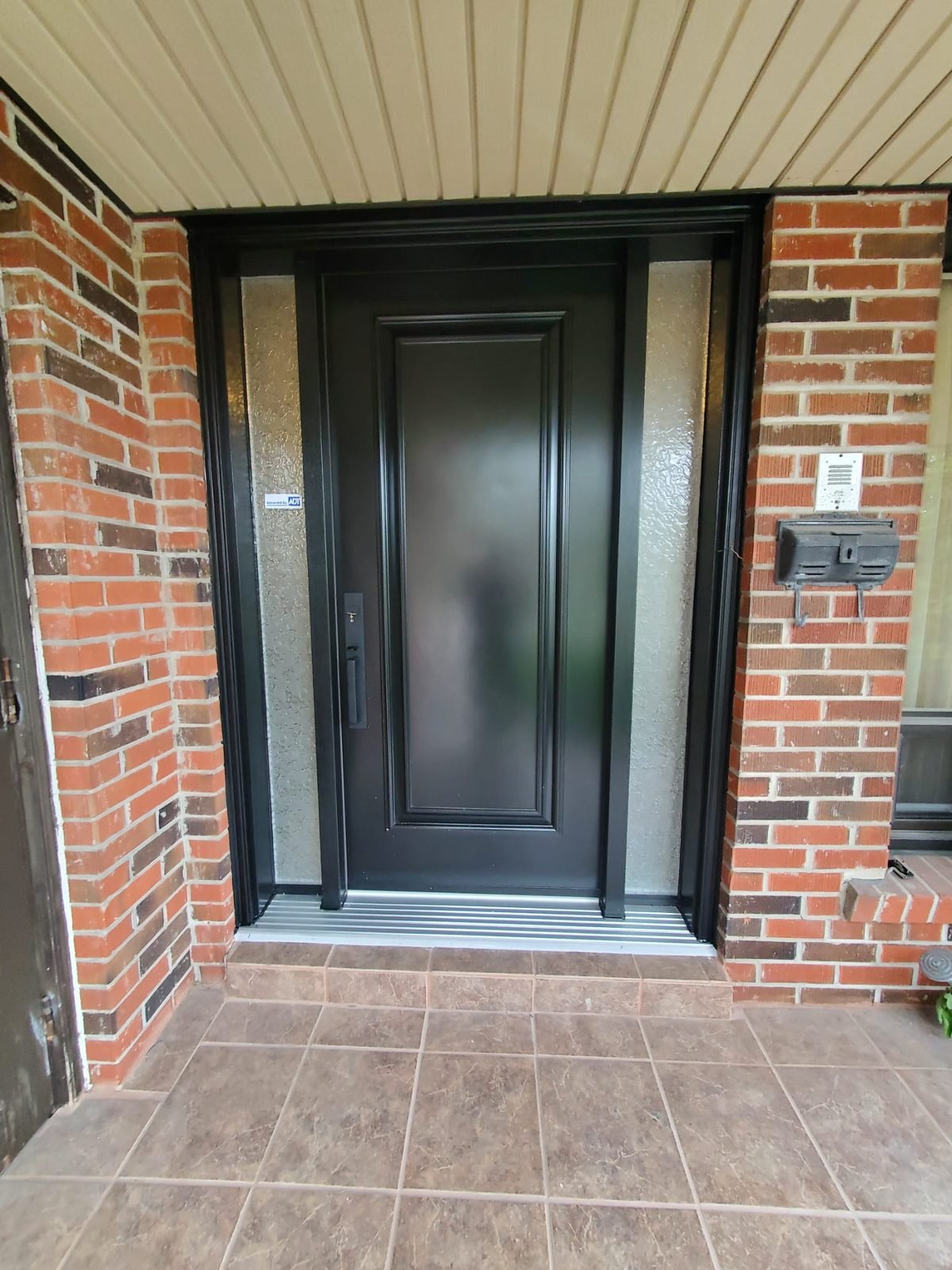 Steel entry door installed by Perla Windows and Doors in the GTA