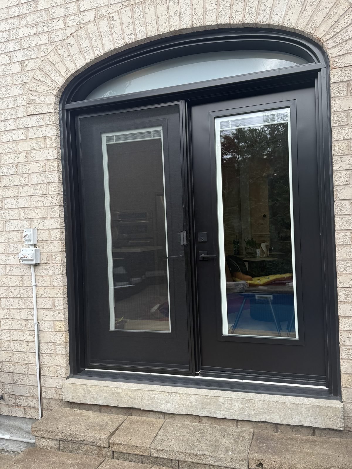 Steel entry door installed by Perla Windows and Doors in the GTA