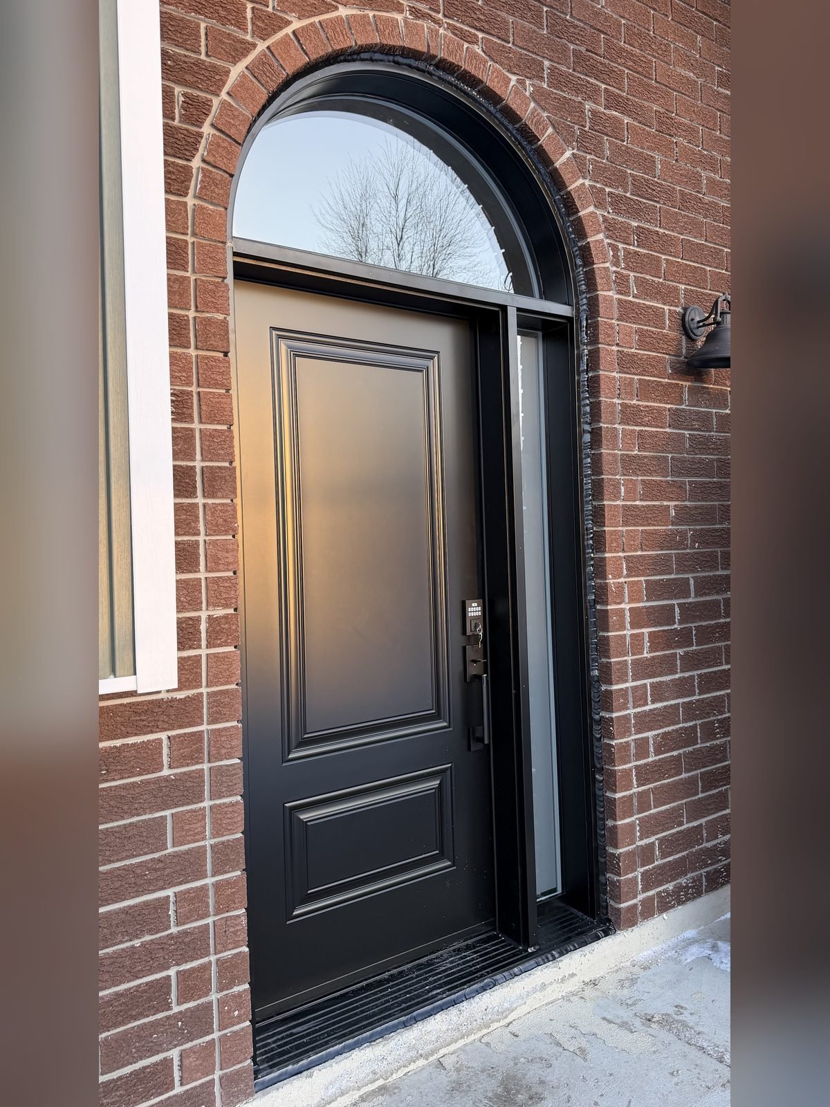 Steel entry door installed by Perla Windows and Doors in the GTA