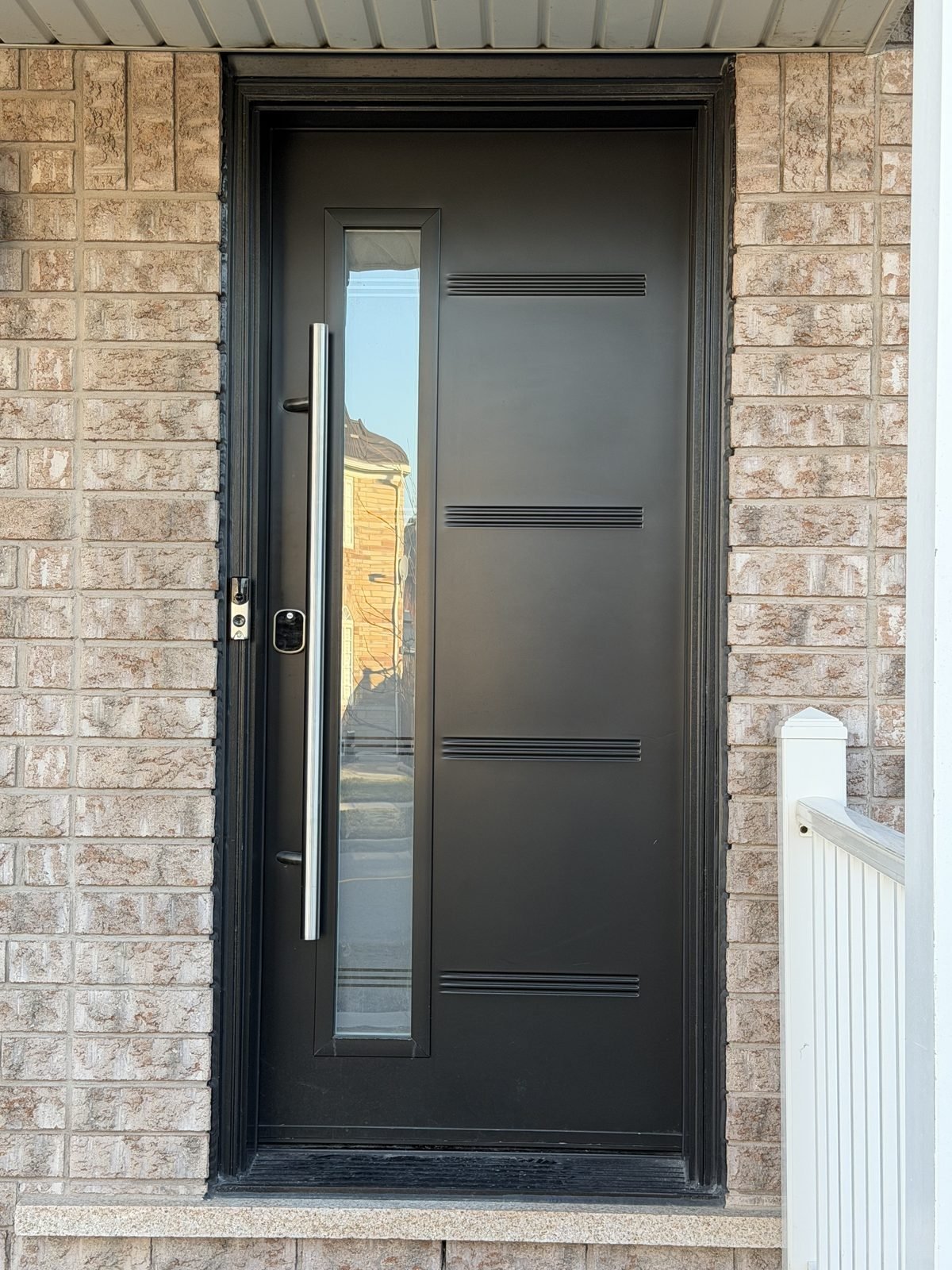 Steel entry door installed by Perla Windows and Doors in the GTA